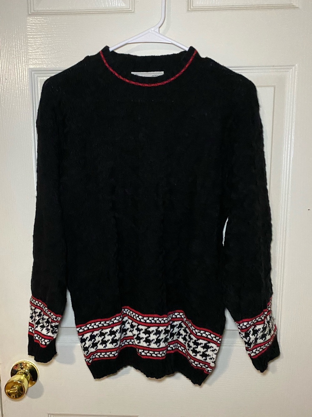 Black Crewneck Sweater with Red and White Houndstooth Trim